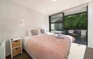 Bedroom 4 Modern Queenstown Apartment & Great Lake Views