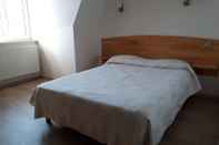ห้องนอน Hotel La Guimbarde
