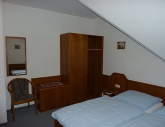Phòng ngủ 2 Hotel Ockenheim