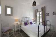 Bedroom Idyllic Holiday Villa Gardenview Nr Beach by VillaRentalsgr