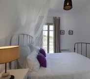 Bedroom 4 Idyllic Holiday Villa Gardenview Nr Beach by VillaRentalsgr