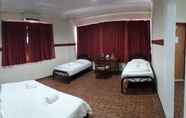 Kamar Tidur 3 Warisan Family Inn