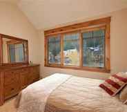 Bedroom 2 Private 3 Bedroom Townhome Located in East Keystone With Access to a Firepit, Hot Tub, and Billiards