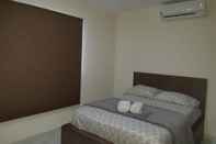 ห้องนอน Aruba Airport Zega Apartments