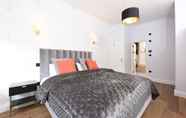 Bedroom 6 Stylish & Spacious Deluxe Apartments near Victoria Station