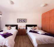 Bedroom 6 Nama White Guest House