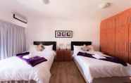 Bedroom 6 Nama White Guest House