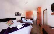 Bedroom 5 Nama White Guest House