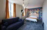 Bedroom 3 Logis Hostellerie Du Marche