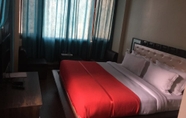 Kamar Tidur 6 Hotel KC Regency