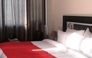 Kamar Tidur 5 Hotel KC Regency