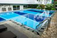 Kolam Renang Pool View 2BR with Sofa Bed Bassura City Apartment