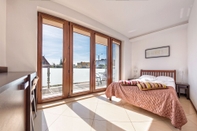 Bilik Tidur Apartamenty Sun & Snow Casa Al Mare