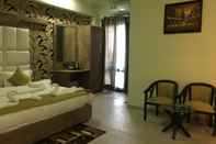 ห้องนอน Hotel Ratan Royal Inn