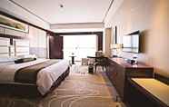 Bedroom 2 Days Hotel & Suites by Wyndham Jiangsu Xinyi