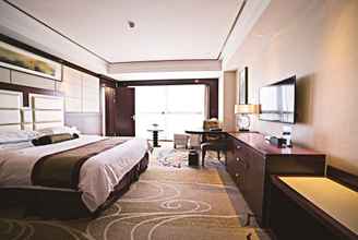 Phòng ngủ 4 Days Hotel & Suites by Wyndham Jiangsu Xinyi
