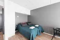 Bedroom Forenom Serviced Apartments Neilikkatie