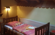 Kamar Tidur 5 Guesthouse Tonkic