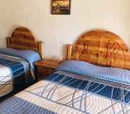 Bedroom 4 Cooper Canyon Trail Head Inn