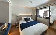 Bedroom 5 Tower Suites by Blue Orchid