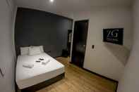 Bedroom Hotel Zugi Inn