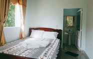 Kamar Tidur 2 Cat Tien Farmer Lodge