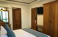 Kamar Tidur 5 Dragon Phoenix Hotel