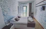 Kamar Tidur 4 Filio Guesthouse