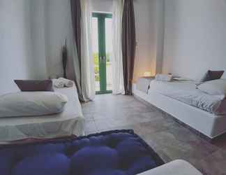 Kamar Tidur 2 Filio Guesthouse