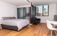 Kamar Tidur 4 Modern Apartment in Darling Harbour