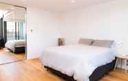 Kamar Tidur 5 Modern Apartment in Darling Harbour