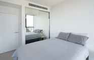 Bedroom 3 Modern Apartment in Darling Harbour