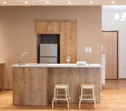 Bedroom 2 Contemporary Apartment made of Wood and Stone