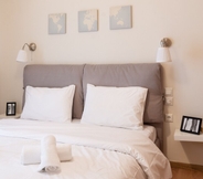 Bedroom 5 Contemporary Apartment made of Wood and Stone