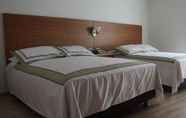 Bedroom 6 Hotel Bachue Girardot