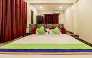 Kamar Tidur 7 Treebo Trip Om Regency