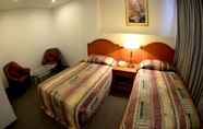 ห้องนอน 6 Kawan Hotel