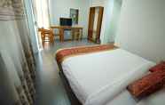 Kamar Tidur 2 Present Hotel