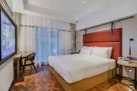 ห้องนอน Manxin Hotel Qingdao Zhanqiao