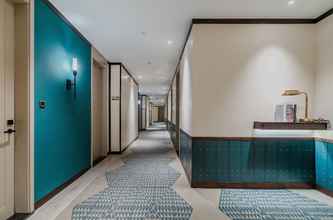 Lobi 4 Manxin Hotel Qingdao Zhanqiao