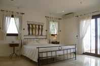 Kamar Tidur Great Villa Very Close to Best Beach