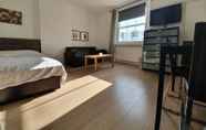 ห้องนอน 7 Studio Apartment in South Kensington 12