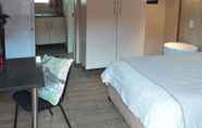 Kamar Tidur 6 DH Guest House