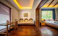 Kamar Tidur 4 Leliving Butterfly Resort Lijiang