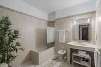 In-room Bathroom Garajau II by An Island Apart