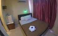 Bilik Tidur 4 Green Town hotel & Resort Kuah