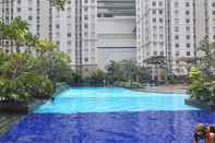Swimming Pool Homey 2BR at Green Bay Pluit Apartment near Mall