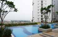 Kolam Renang 4 Simply 2BR with Pool View Bassura City Apartment