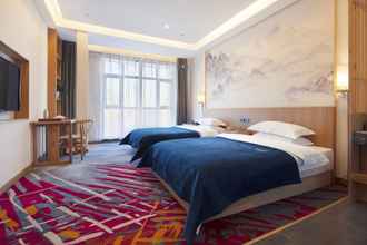 Kamar Tidur 4 Qianna Hotel Zhengzhou Jingguang Road