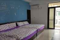 Kamar Tidur New Summer Hostel